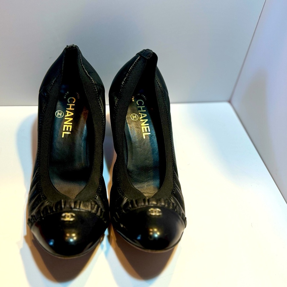 Vintage Chanel black slip on.